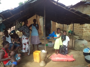 The distribution of food and supplies by Rev. Kargbo to victims of the Ebola virus in Sierra Leone.